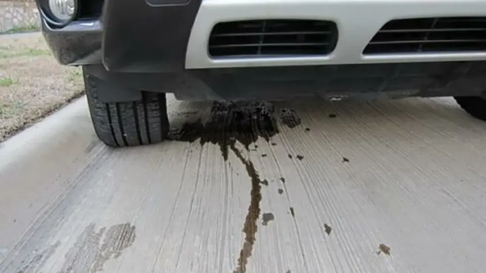 How can car owners determine which kind of fluid is leaking from underneath the car guide thumbnail