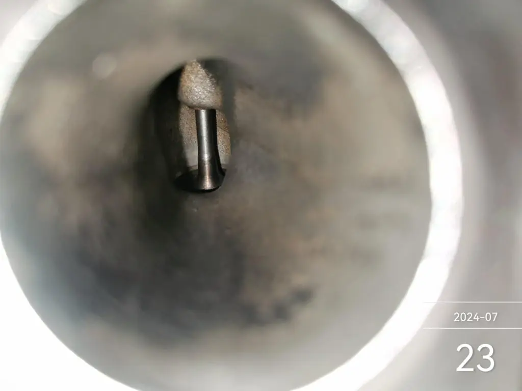 Vehicle intake valve after walnut blasting cleaning