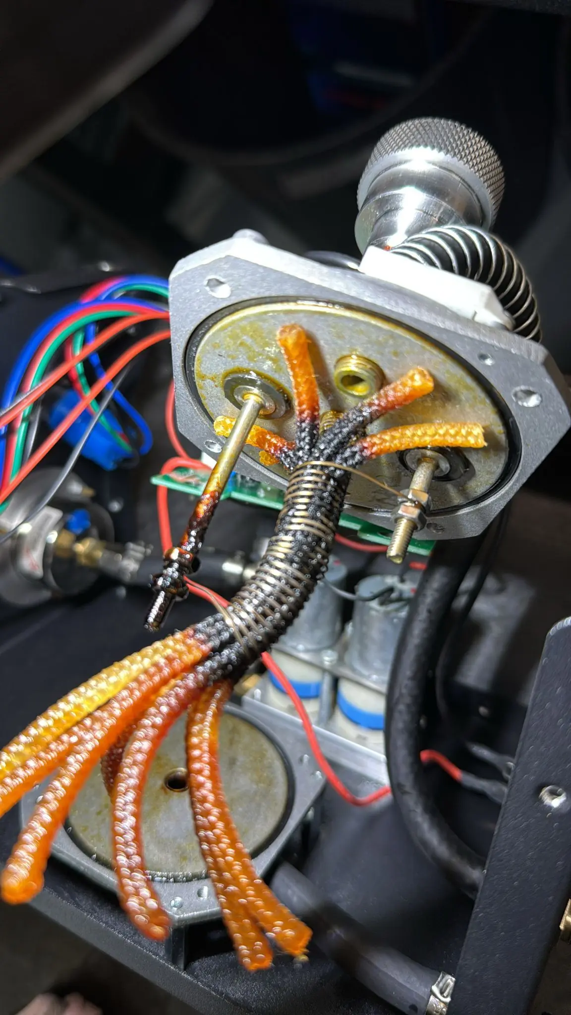 Burned heating cotton inside a smoke leak detector